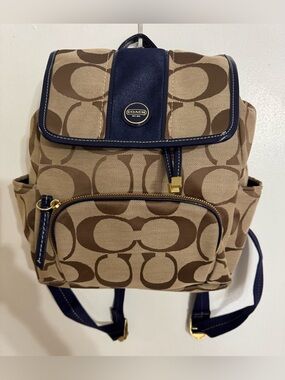 Coach signature monogram backpack in brown & beige with a navy stripe EUC